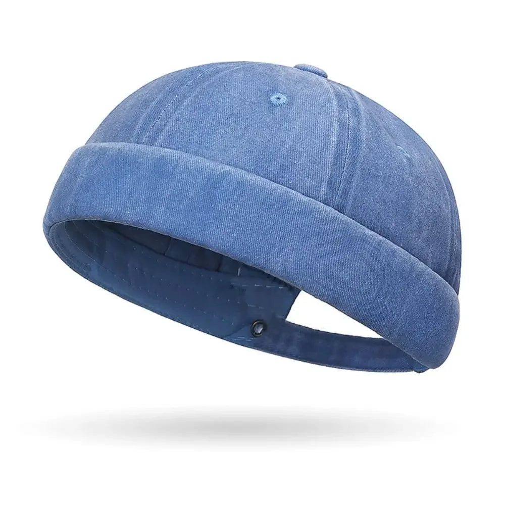 Blue denim cap on a white background