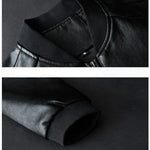 Close-up of black pants with a belt buckle on a dark background