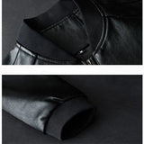 Close-up of black pants with a belt buckle on a dark background