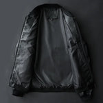 Black leather jacket on a dark gray background