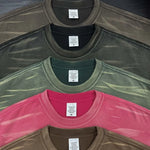 Sun-faded gradient oversized tee worn on model — front