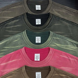 Sun-faded gradient oversized tee worn on model — front