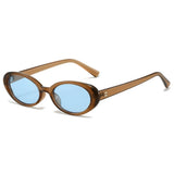 Tea Blue Tea and blue oval gradient sunglasses worn outdoors on model — The Unrivaled Brand