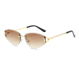 Gold-framed sunglasses with gradient lenses on a white background