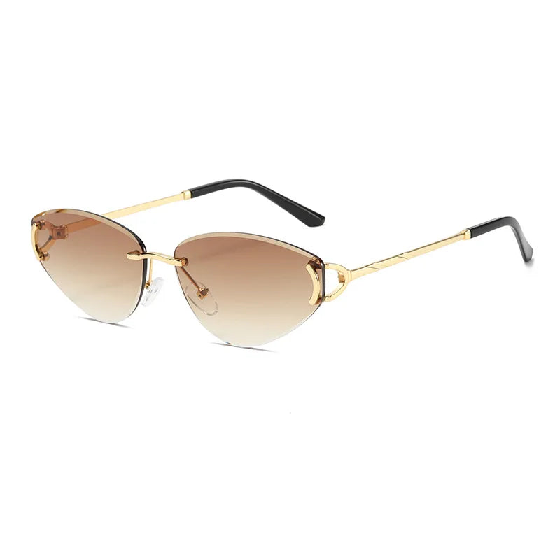 Gold-framed sunglasses with gradient lenses on a white background