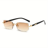 Sunglasses with gold gradient lenses and black frames on a white background