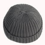 Gray knit beanie on a white background