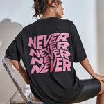Wavy letter print oversized graphic tee — worn front view