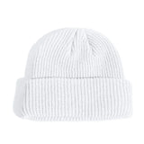 White knit beanie on a white background