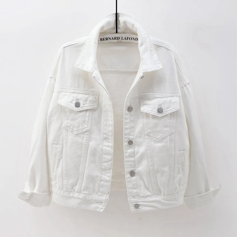 White Model wearing women's oversized white denim jacket, styled on-figure