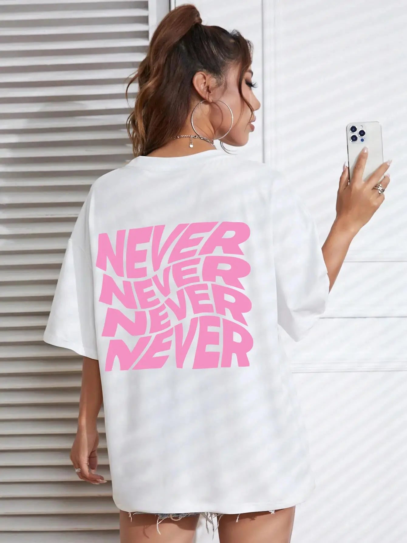 White Wavy letter print oversized graphic tee — lifestyle shot 4