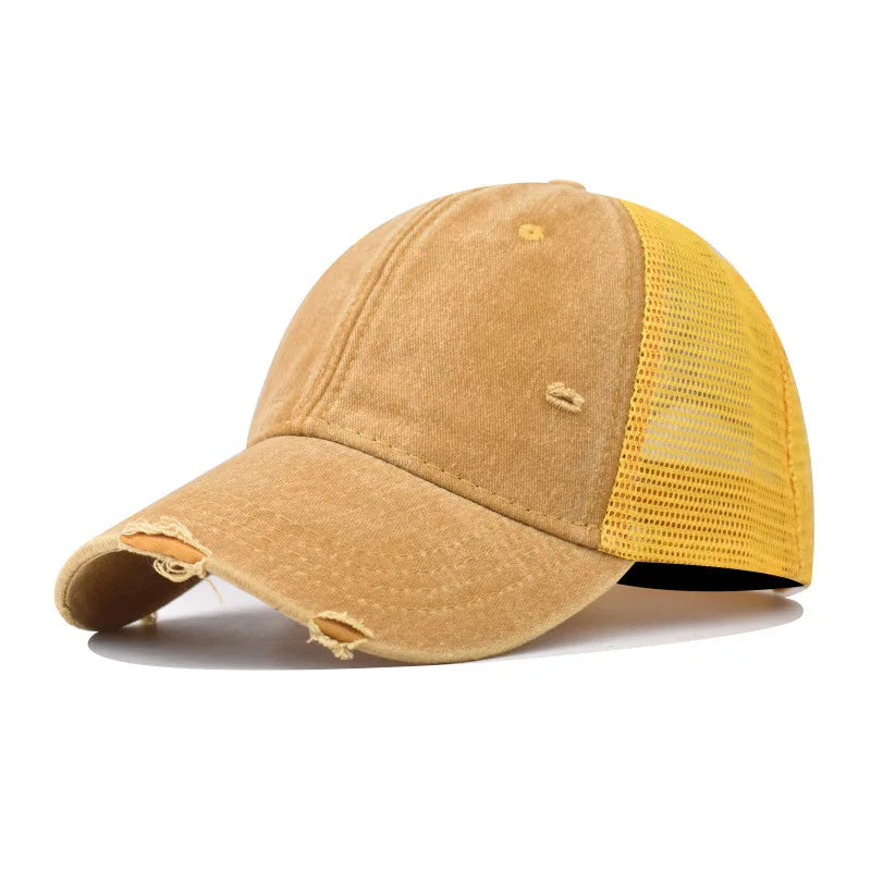 Yellow Distressed vintage wash trucker hat worn, angled view