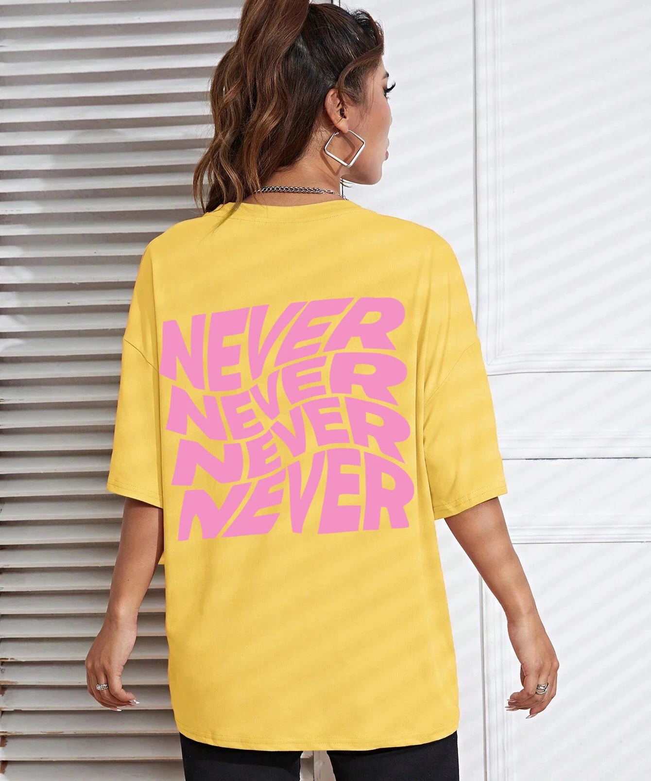 Yellow Wavy letter print oversized graphic tee — lifestyle shot 7