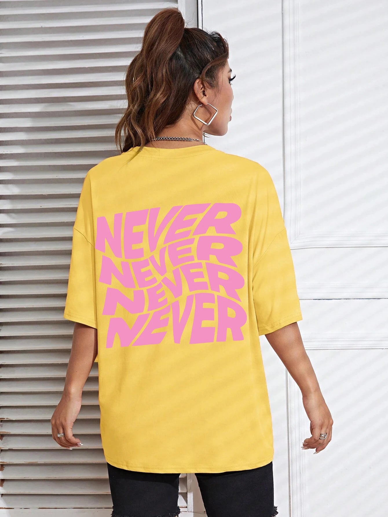 Yellow Wavy letter print oversized graphic tee — lifestyle shot 7