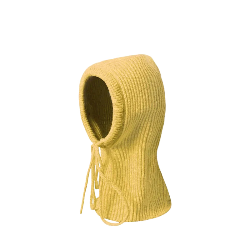 Yellow knitted hood on a light gray background