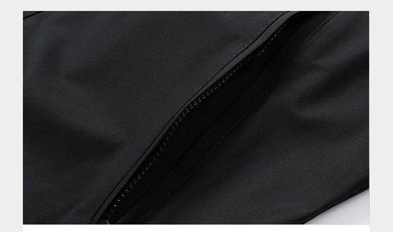 Close-up of a black fabric texture with a zipper