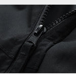 Close-up of a black zipper on a black jacket