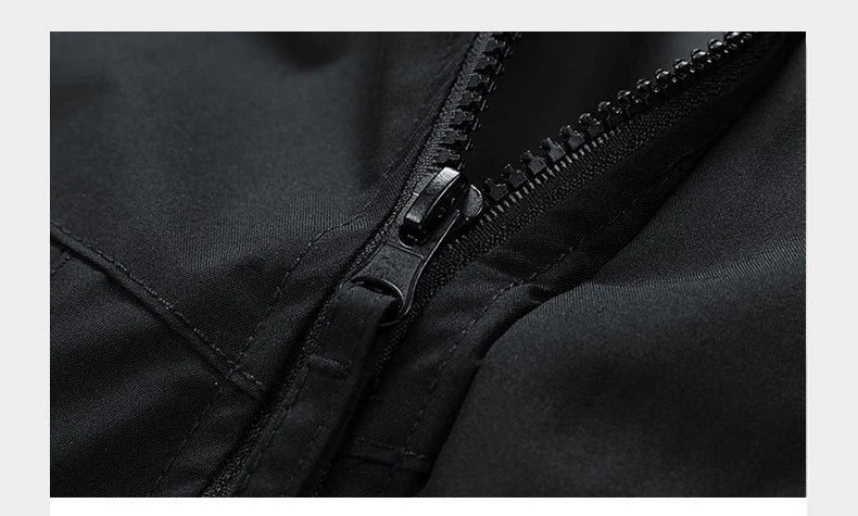 Close-up of a black zipper on a black jacket