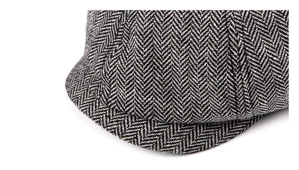 Black And White Newsboy cap flat lay close-up of herringbone brim and panel stitching