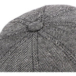 Black And White Newsboy cap close-up of top panel seams and button on crown