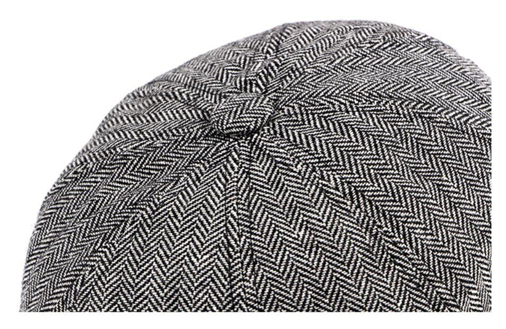 Black And White Newsboy cap close-up of top panel seams and button on crown