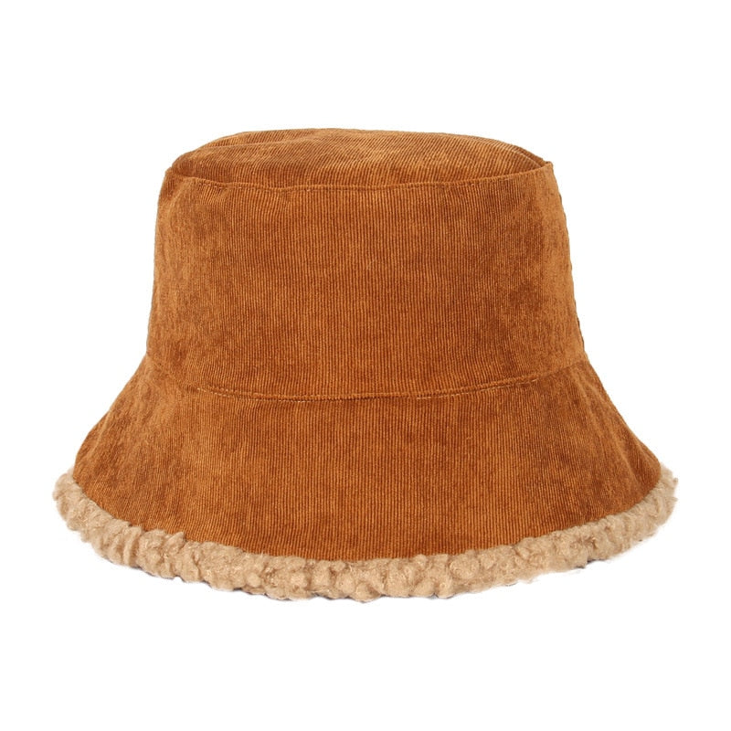 Brown Fluffy bucket hat side view showing corduroy crown and shearling brim trim