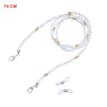Color 18 Beaded glasses chain coiled showing clear beads with gold accent spacers