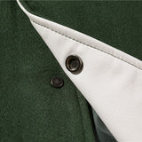 Green Baseball jacket close-up of snap button closure and leather placket