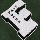 Green Baseball jacket close-up of chenille letter patch embroidery on chest