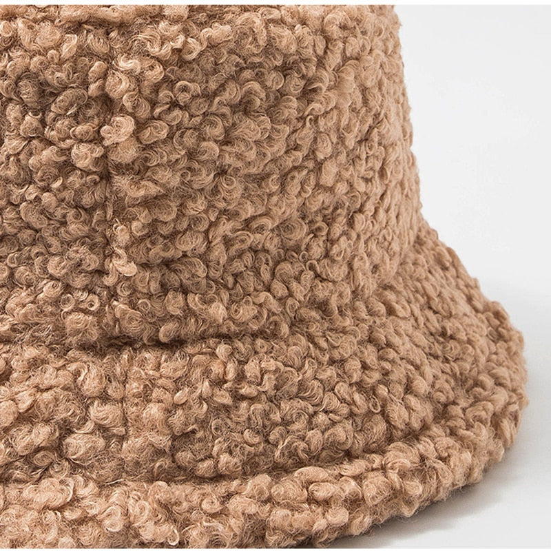 Khaki Shearling bucket hat close-up of textured faux shearling fabric and brim stitching
