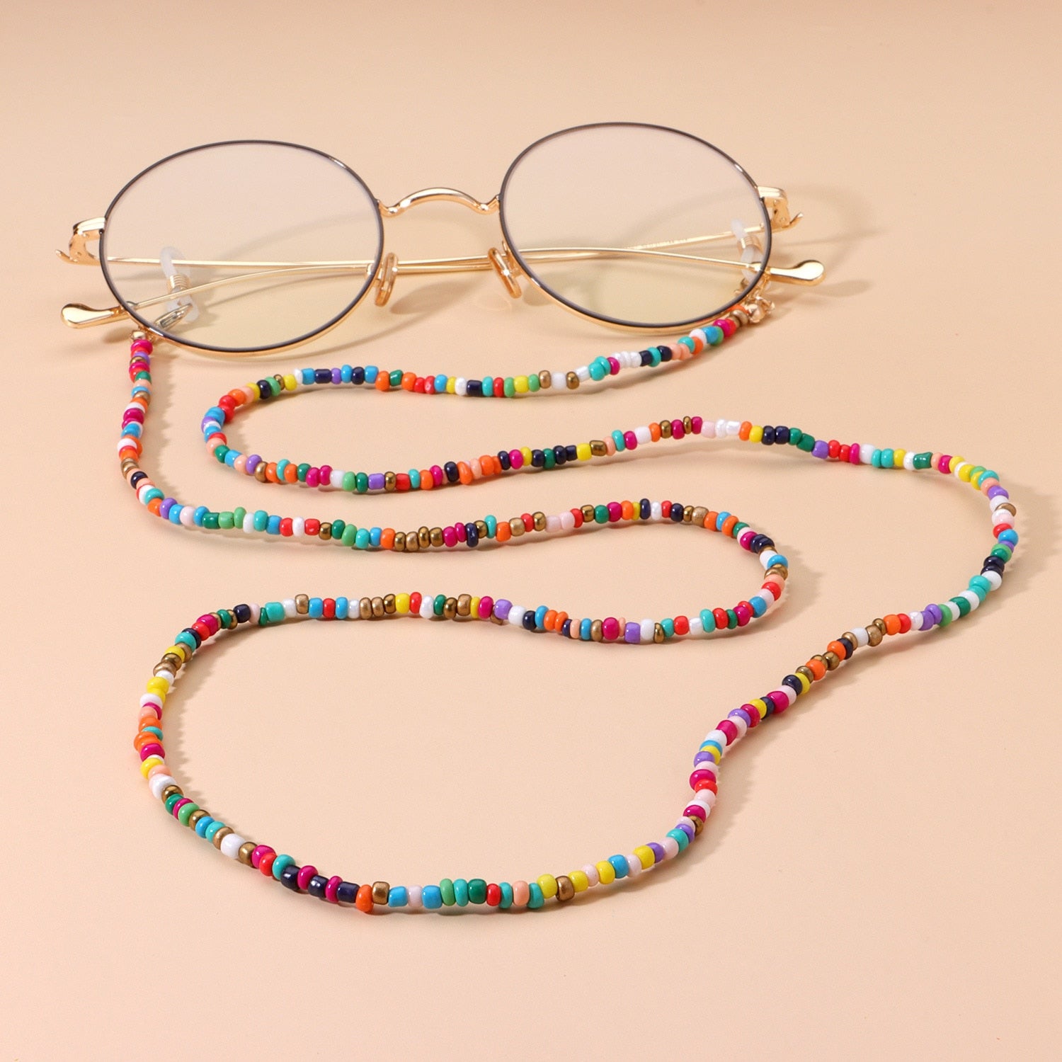Multicolor Beaded glasses chain attached to round sunglasses showing clasp connection