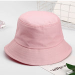 Pink Kids bucket hat angled view showing rounded crown and brim stitching