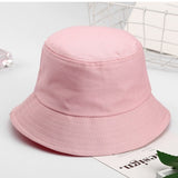 Pink Kids bucket hat angled view showing rounded crown and brim stitching