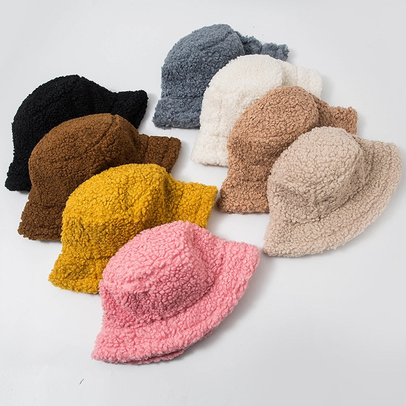Shearling bucket hat displayed together in multiple colorway options