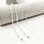 Silver Color Eyeglasses chain flat lay showing pearl strand and link chain with lobster clasps