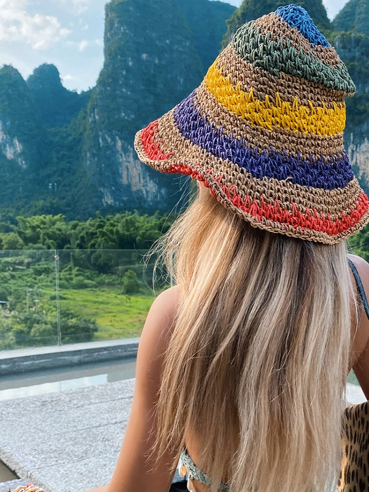 Tan Multicolor Crochet bucket hat worn by model from behind showing crown and brim shape